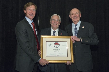 In a photo from 2013, J. Larry Jameson, MD, PhD, EVP of the University of Pennsylvania for the Health System and dean of the Perelman School of Medicine, John Glick, MD, professor emeritus, and Ralph W. Muller, then-CEO of UPHS, pose with a certificate signifying the establishment of the Academy of Master Clinicians.
